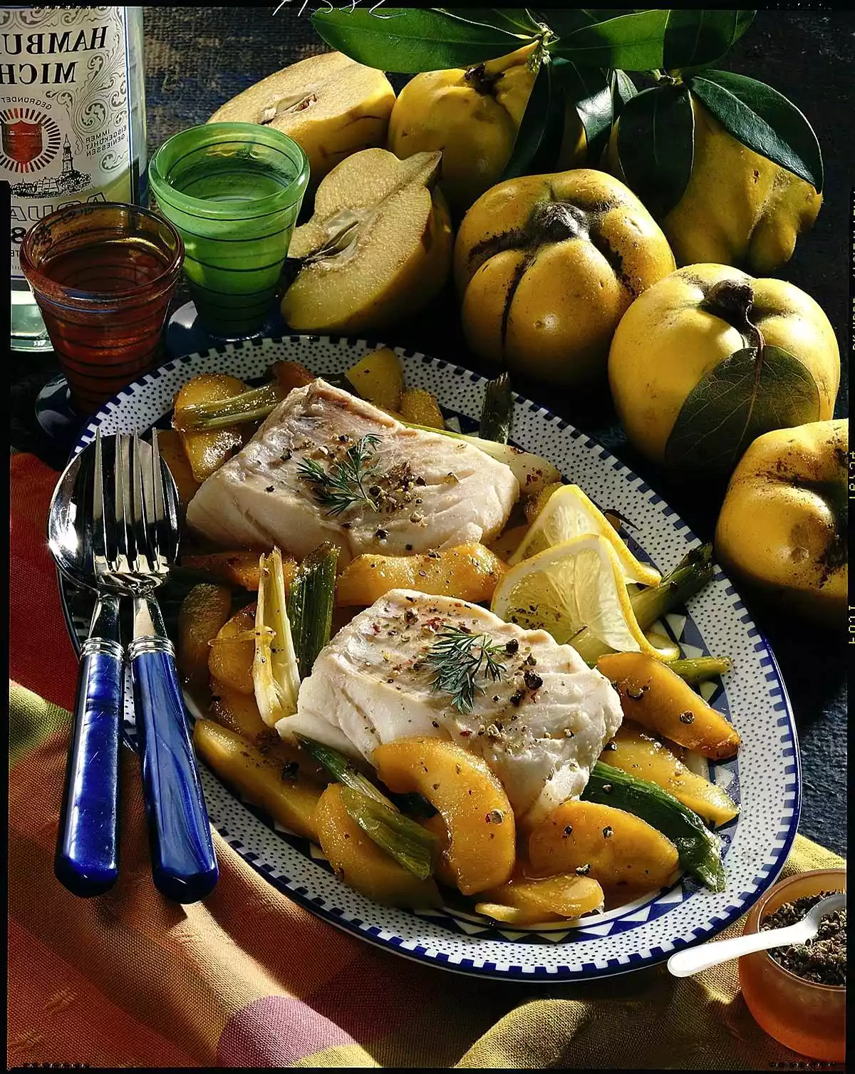 Cod fillets with quince and spring onion vegetables