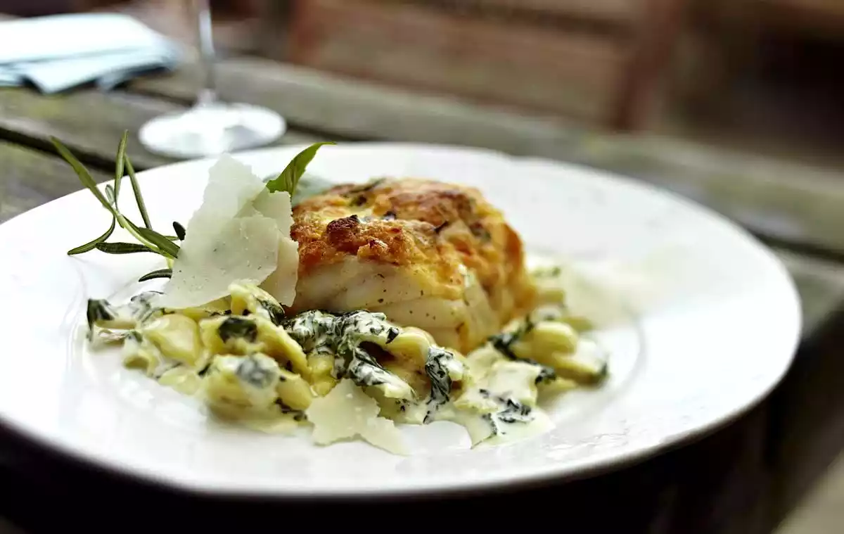 Cod Under A Mozzarella Crust With Ravioli And Spinach Recipe