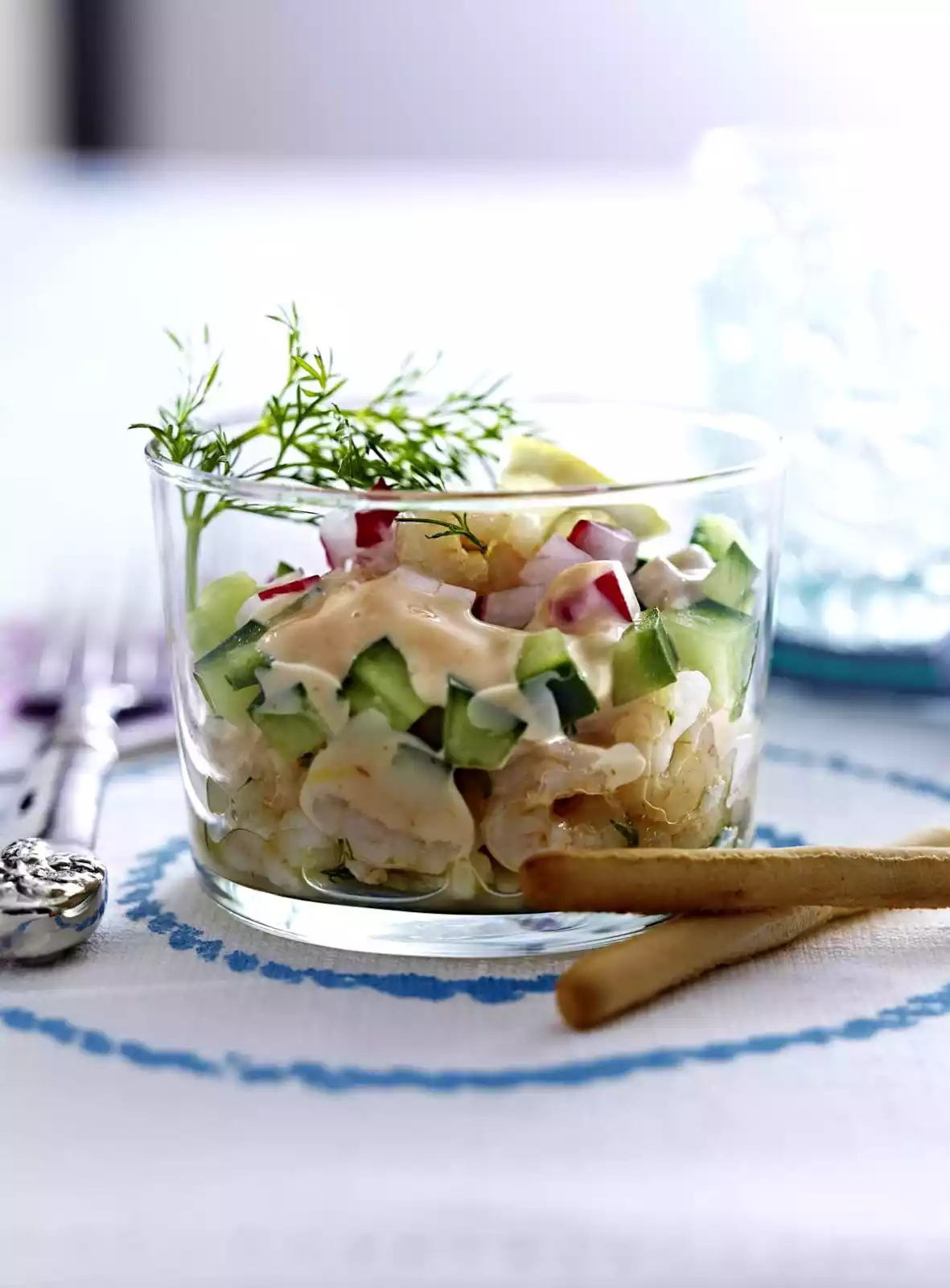 Cucumber-radish cocktail with ice sea shrimps